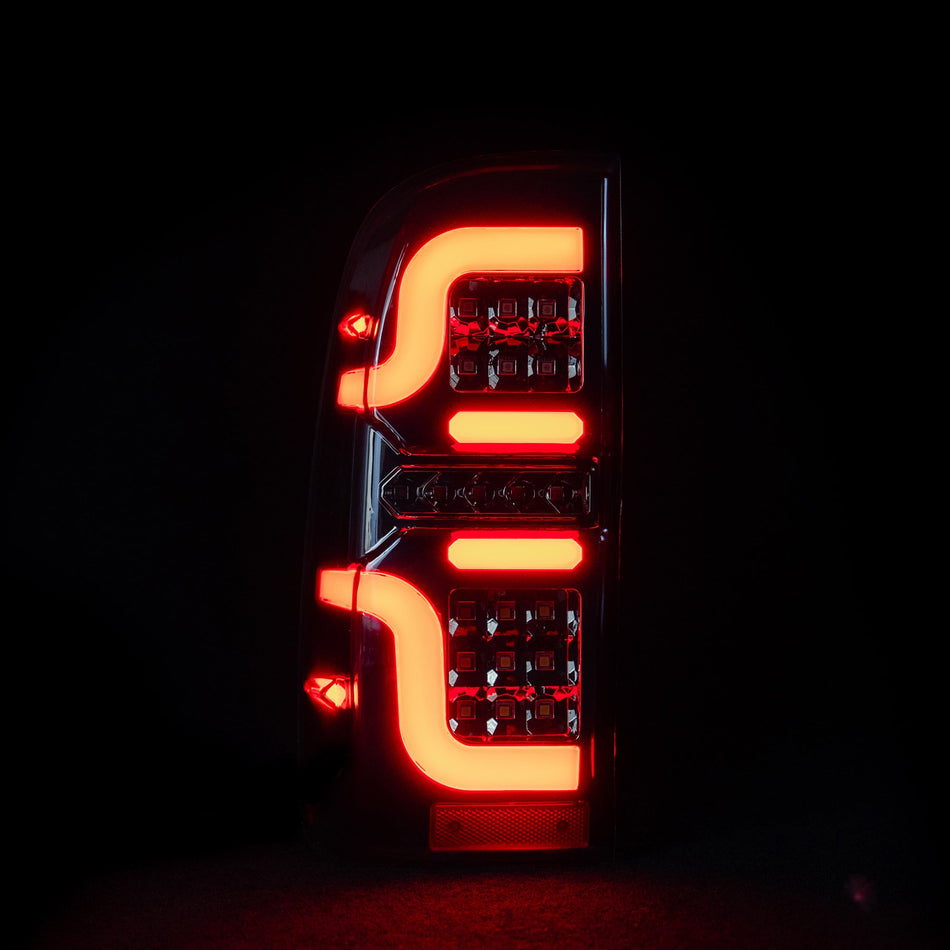Blacked Out 'Swirl' LED Tail Lights for N70 Hilux